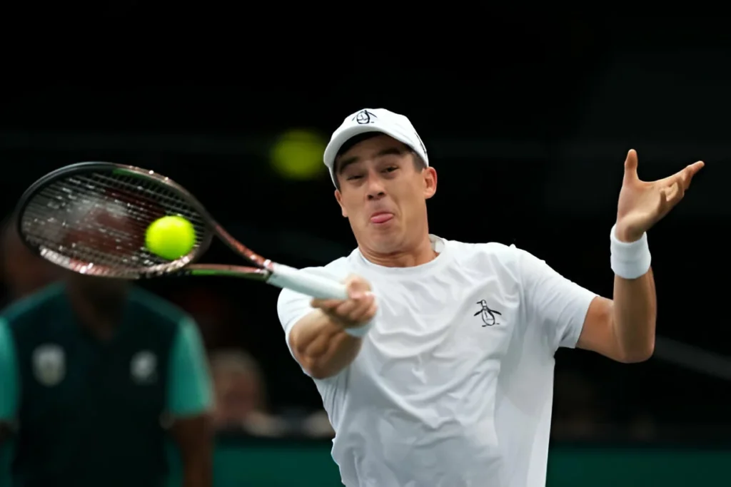 US' Mackenzie Mcdonald plays a forehand return to Italy's Jannik Sinner during their men's singles match on day three of the Paris ATP Masters 1000 tennis tournament at the Accor Arena - Palais Omnisports de Paris-Bercy - in Paris on November 1, 2023. (Photo by Dimitar DILKOFF / AFP) (Photo by DIMITAR DILKOFF/AFP via Getty Images)