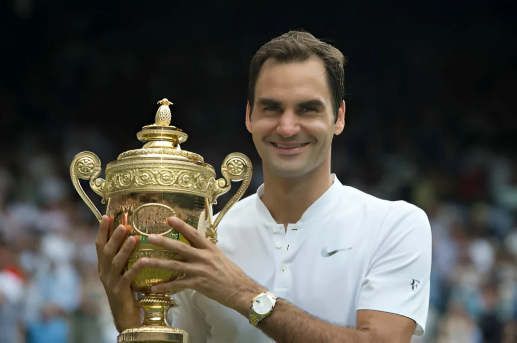 LONDON, ENGLAND - JULY 16: Roger Federer of Switzerland poses for photographs as he celebrates winning the Men's Singles Final against Marin Cilic on day thirteen of the Wimbledon Lawn Tennis Championships at the All England Lawn Tennis and Croquet Club on July 16, 2017 in London, England. (Photo by Visionhaus/Corbis via Getty Images)