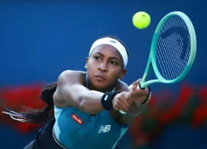 TORONTO, ON - AUGUST 09: Coco Gauff of the United States hits a shot against Diana Shnaider during Day 4 of the National Bank Open, part of the Hologic WTA Tour at Sobeys Stadium on August 9, 2024 in Toronto, Ontario, Canada. (Photo by Vaughn Ridley/Getty Images)